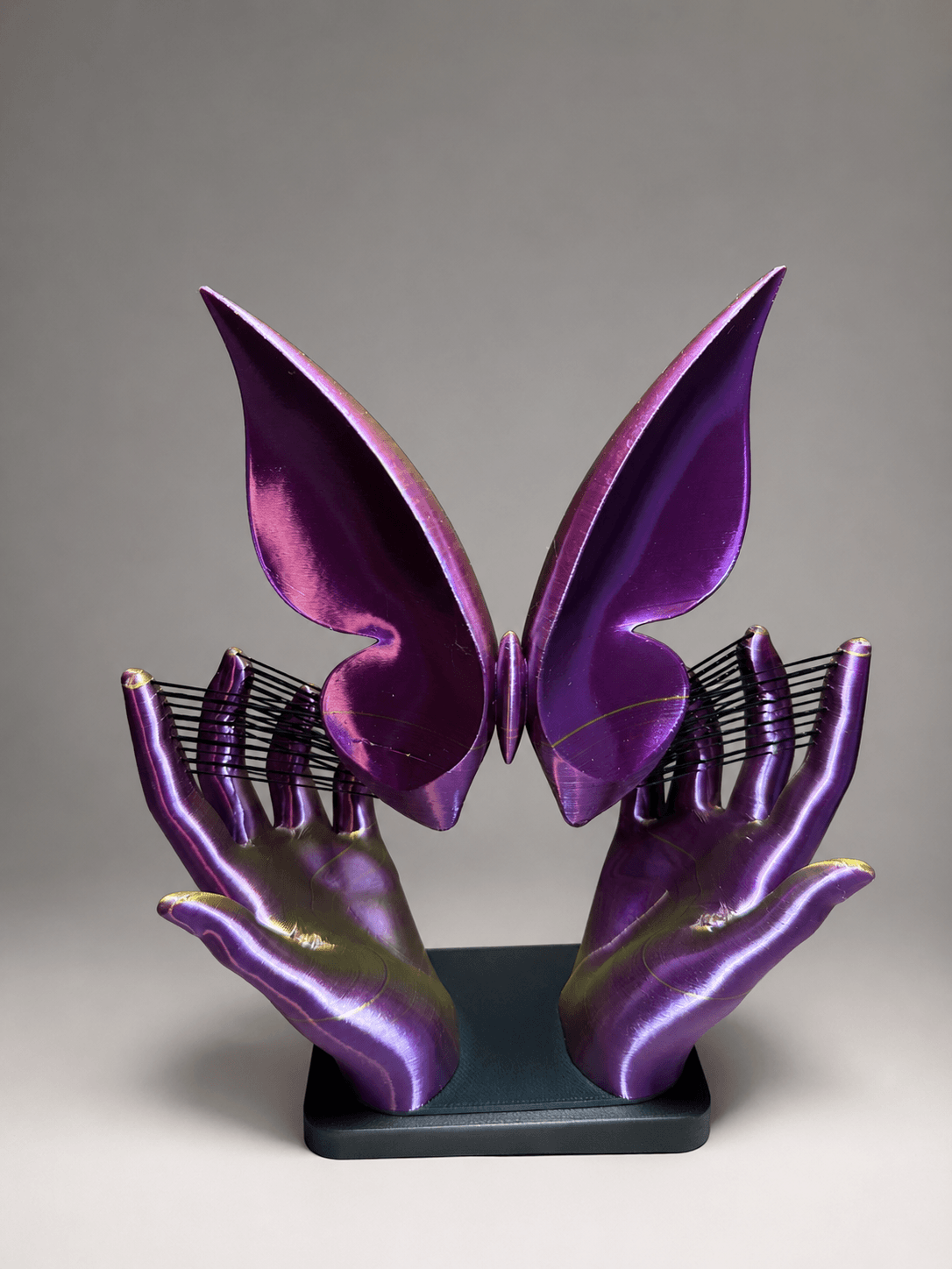 Butterfly in Hands Sculpture